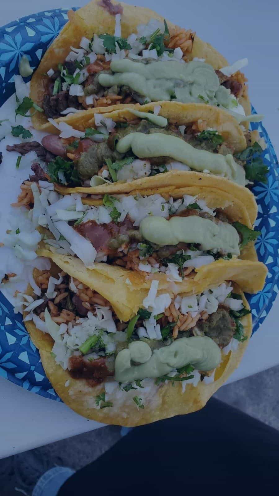 Chicali Tacos mesquite-grilled street tacos topped with avocado salsa