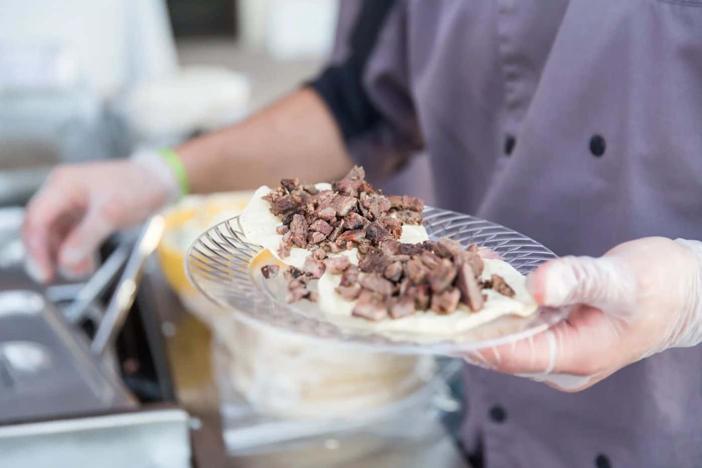 A Chicali Tacos Taco Master serving mesquite-grilled carne asada at a Las Vegas event